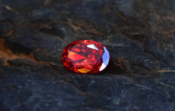 istock ruby Is a beautiful red gemstone on a wooden floor 2168985736