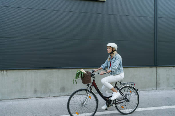 istock Young woman on a bicycle 2168988646