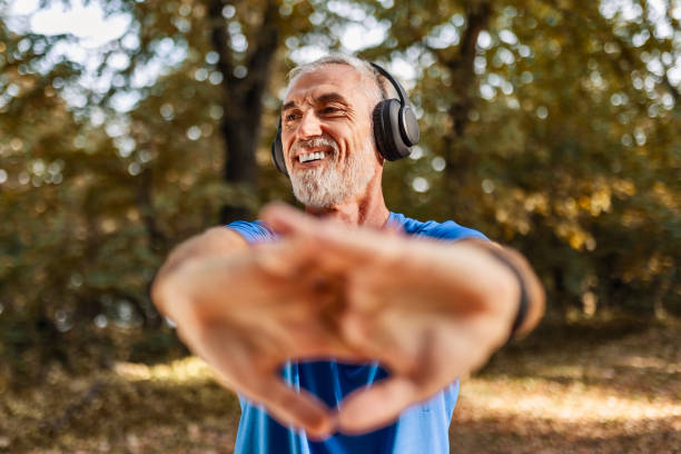 istock Active Senior Prepares for a Run with Headphones 2168988835