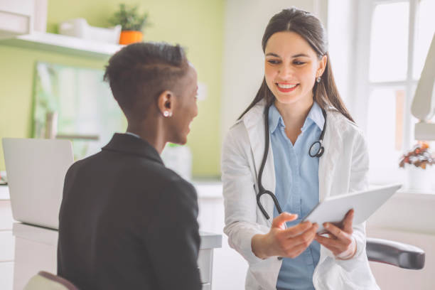 istock Doctor consulting her patient 2168993612
