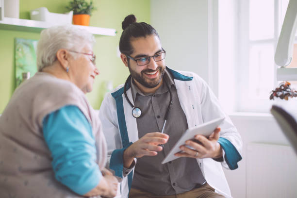 istock Doctor consulting her patient 2168994245