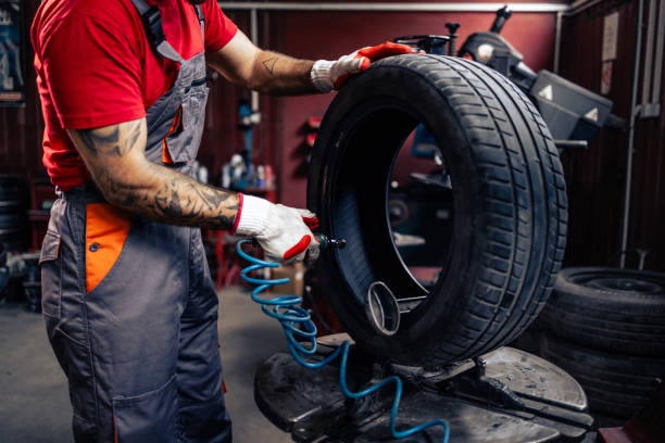 istock Repairman using tire repair kit tools. 2168995360