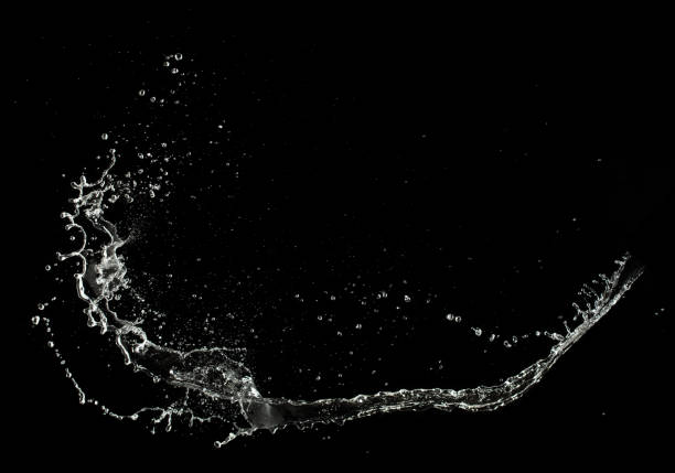 istock Throwing water to object make curve drop splash in explosion motion. Black background isolated. Throwing Splatter Water splash hit on object to create shape form fluttering in droplet and wave 2168997935