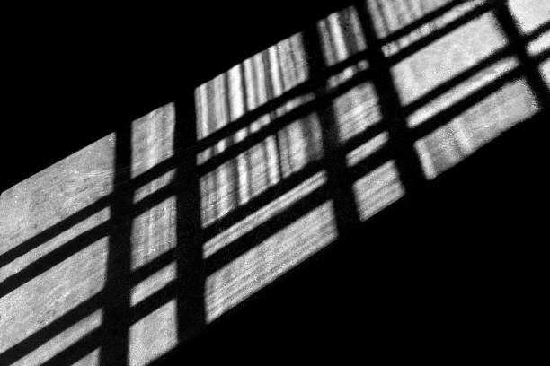 istock Natural light from window light. Light from window falls on the floor in dark room. 2168998628