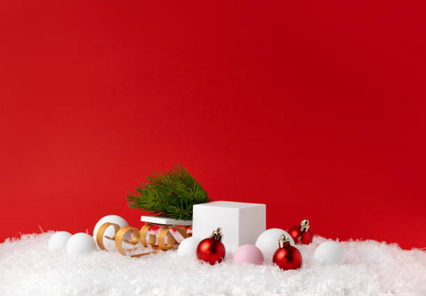 istock Christmas Product Presentation Background with White Cube and Christmas Tree Sleigh . Perfect for Holiday Marketing, Seasonal Promotions, and Winter-Themed Design Projects. Studio photography. 2168999809