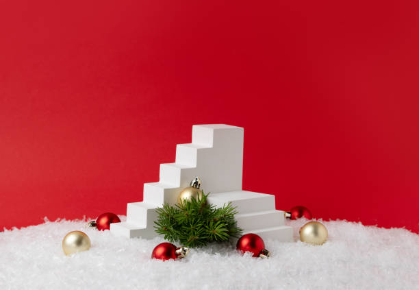 istock Christmas Product Presentation Scene made with Two White Staircase Props, Christmas Tree and Ornaments. Perfect for Holiday Marketing Projects. Studio photography. 2168999825