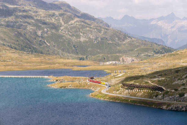istock Scenic Train Journey Through Mountainous Landscape 2169003877