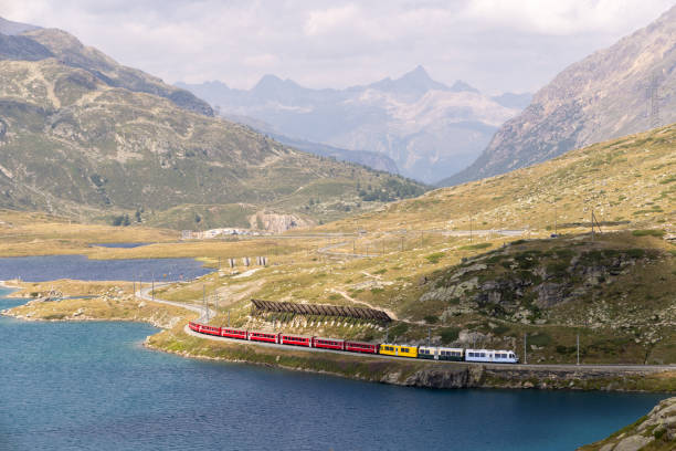 istock Scenic Train Journey Through Mountainous Landscape 2169003878