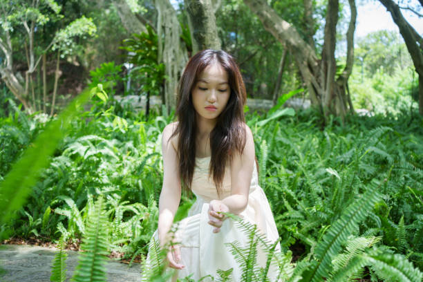 Beautiful woman in forest park