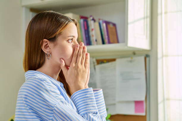 istock Upset sad young female looking at window, profile view 2169015349