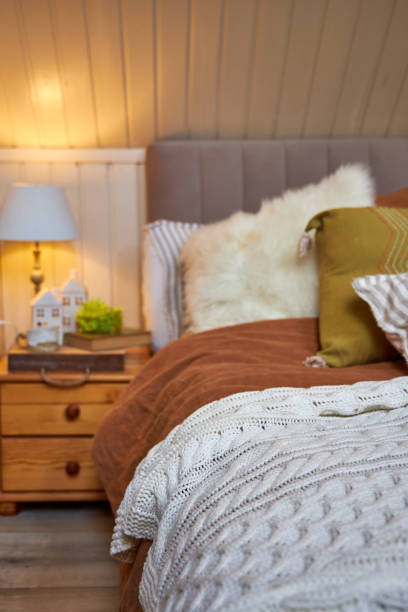 istock Decor of a double bed with colorful pillows in modern style 2169021270