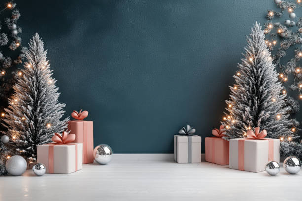 istock Christmas themed background with presents and snow covered trees 2169027715