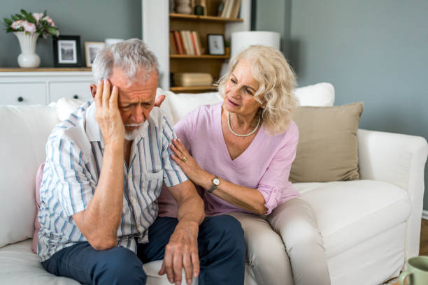 istock Woman supporting her husband during a difficult time at home 2169030688