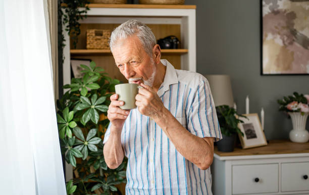 istock Senior man drinking first morning coffee 2169031425