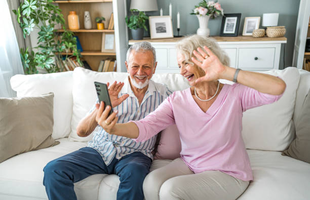 istock Senior couple having a video call at home 2169032565