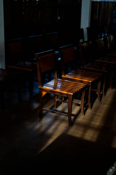 chair in dark room with spot light