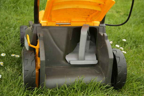 istock Close up image of lawn mower with inserted mulching plug, a cutting function that finely shreds the clippings and spreads it over the ground as a fertiliser. 2169039374