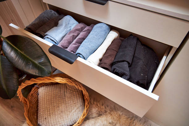 istock dresser with a pull-out drawer with clothes in the bedroom 2169042535