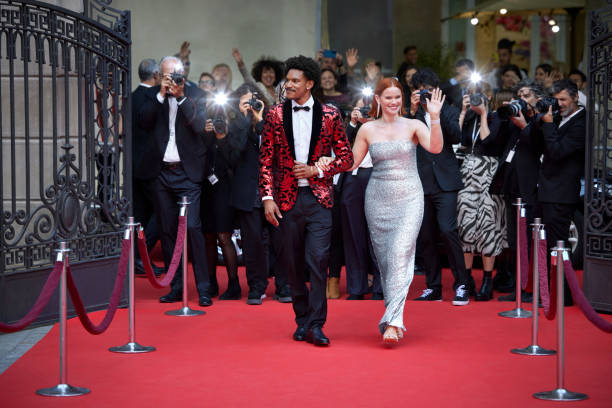 istock Couple arriving at red carpet event 2169043739