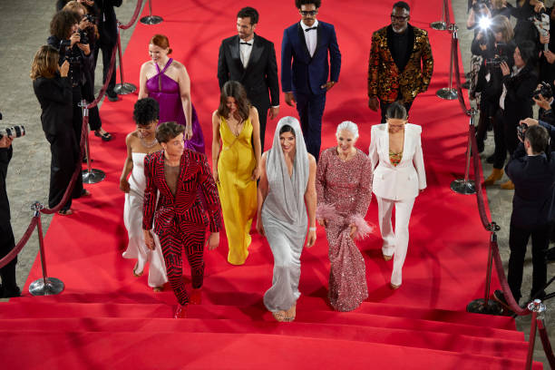 istock Celebrities moving up on steps at red carpet 2169044009