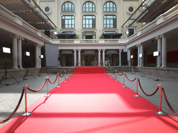 Red carpet arrival at entertainment building