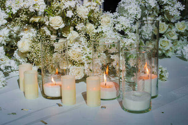 istock Large glass glasses, candlesticks with burning candles. 2169048857