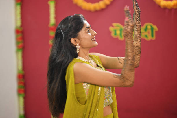 istock Joyful Bride dancing during her Mehandi ceremony 2169051589