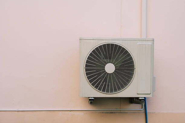 istock Air compressor or air condenser unit located on support outside building to heat released transferred to surrounding environment, Compressor is part of cooling function and air conditioning HVAC syste 2169053265