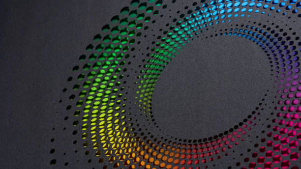 istock Intricate paper cutout art in a circular pattern with a vibrant rainbow gradient on a dark background. 2169057960