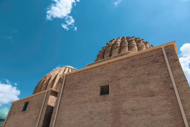 The back part of the Shah-i-Zinda Mausoleums in Samarkand, Uzbekistan, with colorful tiled domes and facades.