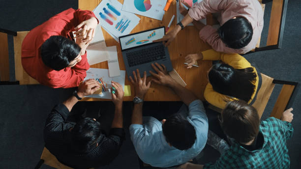 istock Top view of smar business people analyzing data and sharing idea. Convocation. 2169061372