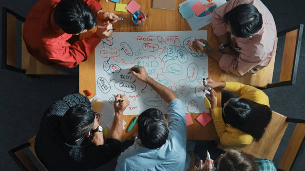 istock Top view of smart business team working together by using mind map. Convocation. 2169062452