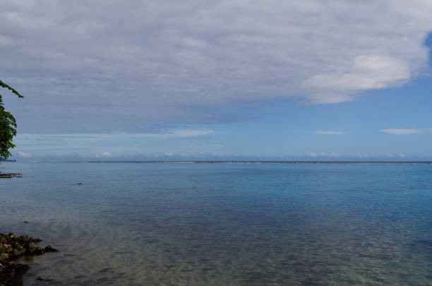 Ocean Inside And Outside Reef Papeete French Polynesia Tahiti South Pacific With Blue Sky And White Clouds