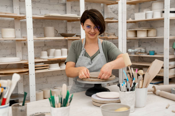 istock Creating ceramic products from flat sheets of clay. Using hands to model a form for a clay project. Building sides for clay products. Slab pottery. 2169067183