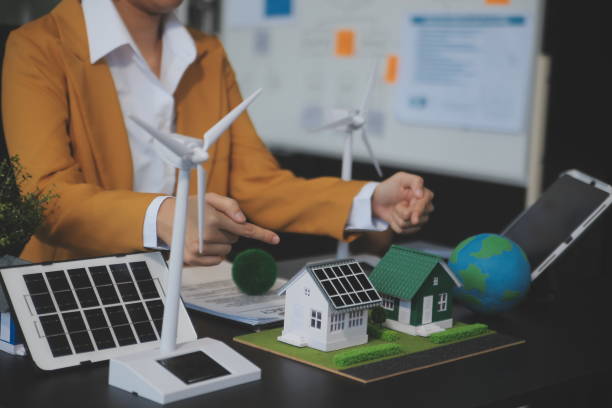 istock Carbon offset price report CO2 emission. Future growth Net zero waste in ESG ethical SME office protect climate change global warming social issues project. Group of asia people Eco friendly SDGs plan 2169067469