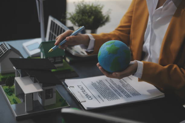 istock Carbon offset price report CO2 emission. Future growth Net zero waste in ESG ethical SME office protect climate change global warming social issues project. Group of asia people Eco friendly SDGs plan 2169067493