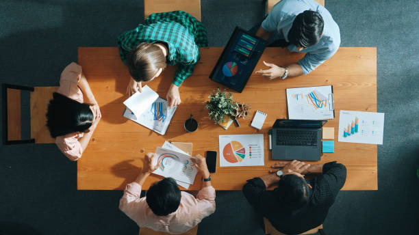 istock Top view of manager use tablet to analyze data and financial chart. Convocation. 2169067593