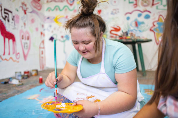 istock Girl with Down Syndrome Creating Art 2169075158