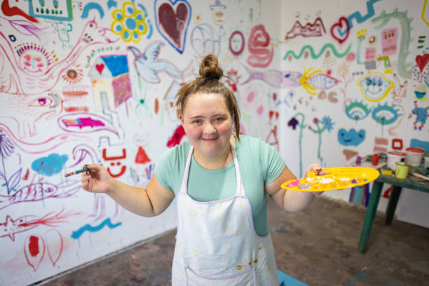 istock Girl with Down Syndrome Enjoying Art 2169075778