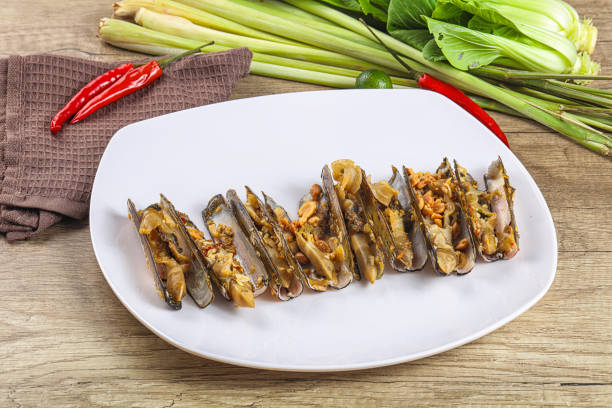 istock Steamed razor mollusk with lemongrass 2169076327