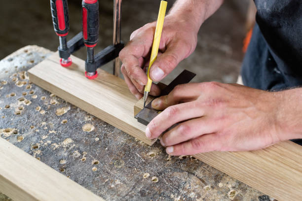 istock A carpenter draws a line with a pencil on an oak part 2169094295