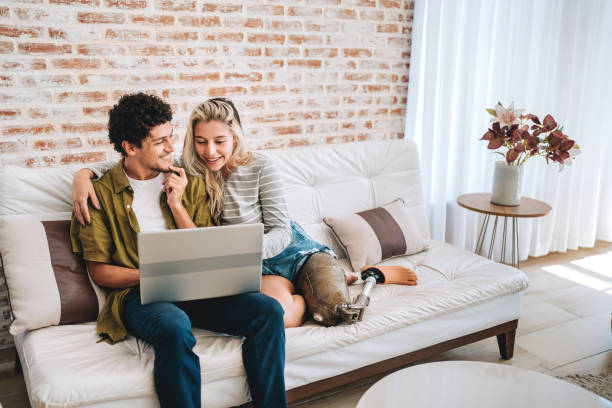 istock Couple using laptop at home 2169102188