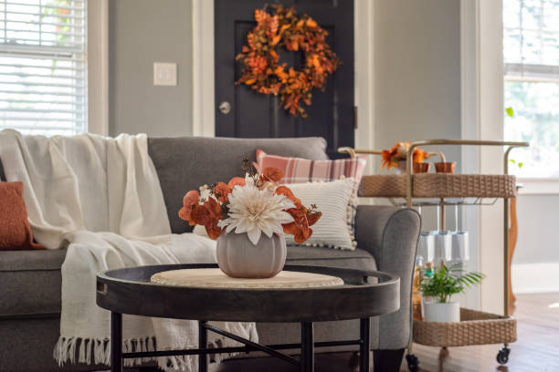 Light and bright living room decorated for fall