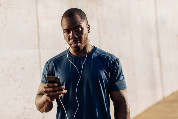 istock Athletic man listening to music 2169108899