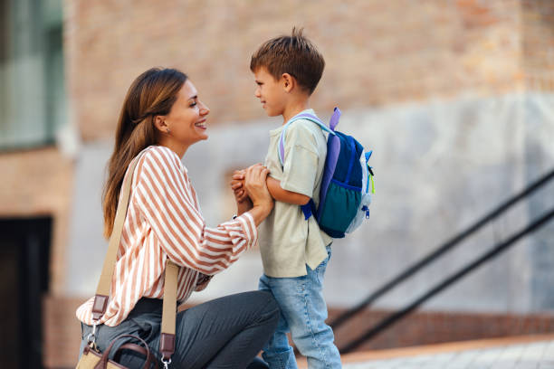 istock Back to School with Mom and Son at Elementary School 2169109287