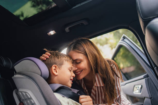 Loving Mother Preparing Son for Back to School Journey