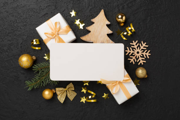 istock Greeting card mockup with christmas decor on concrete background, top view 2169110487
