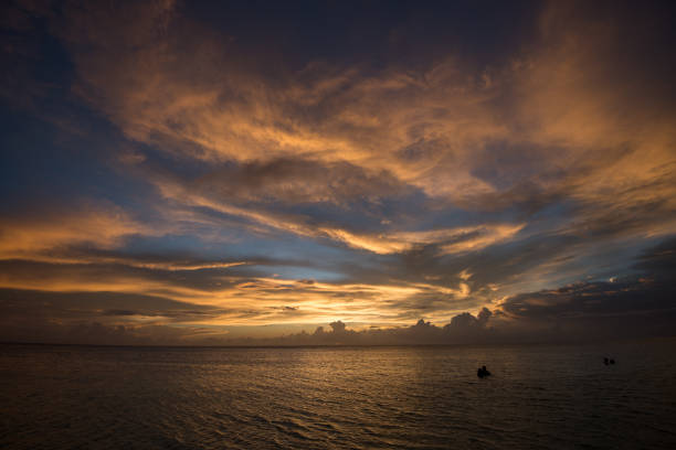 Sunset seen from West Bay Beach,  in Roatan, one of the Islands of Honduras