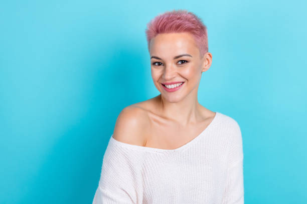 istock Photo of stunning glad lady dressed comfort white trendy pullover demonstrate empty space isolated on blue color background 2169124050