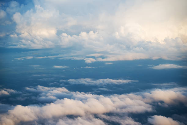 istock Sunrise above the clouds from an airplane window 2169138218